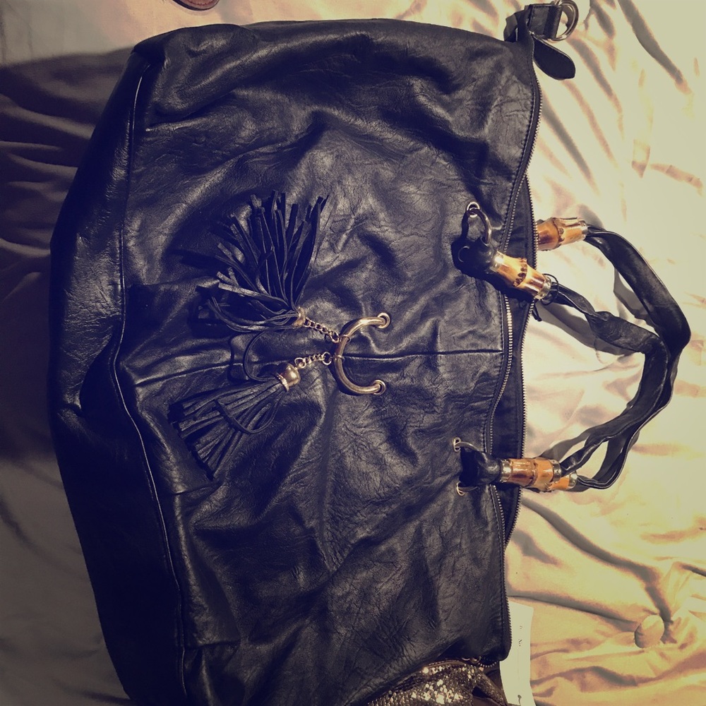 Large black shoulder bag with cool accents